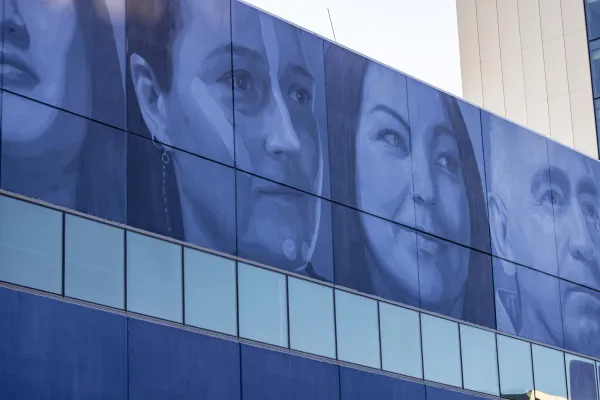 Large scale blue and white mural of First Nations people from Geelong and the region