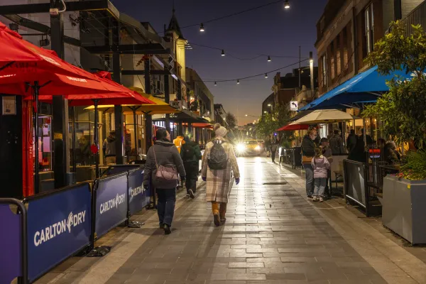 A photo of Little Malop St at night
