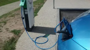 Electric Vehicle Plugged In - Increasing electric vehicle uptake
