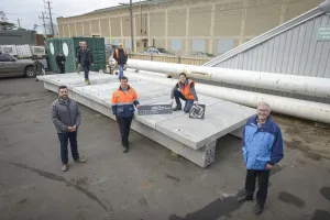 Smiles all round with final bridge testing completed.