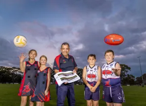 Netballers Jessica and Grace, Club President Heath Menhennet and footballers Alexander and Rohan from Anakie Football Netball Club