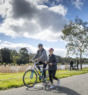 Cyclist riding bike along the Barwon River.