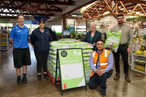 Cr Elise Wilkinson with Amy Mallet and Jasmine Dagg from Mitre 10, Jai Stonehouse and Satar Rahimi from the City’s Waste Services Organics team at Fagg’s Mitre 10 South Geelong celebrating the launch of Better for Geelong compost. Councillor Elise Wilkinson stands next to a stack of Better for Geelong compost bags at Mitre 10 South Geelong joined by Amy Mallett and Jasmine Dagg from Mitre 10 and Jai Stonehouse and Satar Rahimi from the City's Waste Services Organics team.