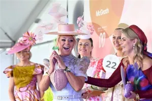 Image of ladies dressed up for fashions on the field