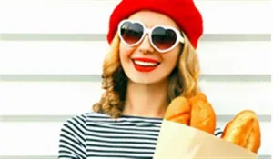 Image of lady wearing a beret with baguettes