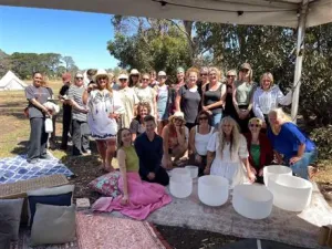 Image of people with singing bowls