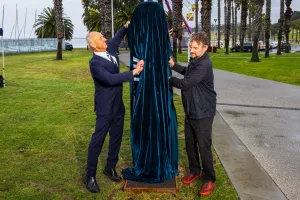 Mayor Stretch Kontelj OAM and Caolan Mitchell unveil the new fibreglass composite prototype at the waterfront