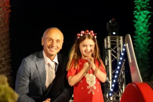Mayor Stretch Kontelj and Charlotte Rockafeller light the Floating Christmas Tree in 2025.