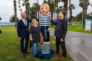Mayor Stretch Kontelj OAM, endorsed bollard artist Vicki Clissold and Caolan Mitchell with the new fibreglass composite prototype at the waterfront