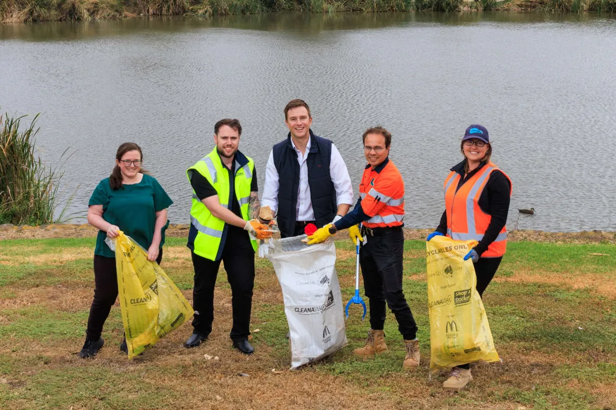 Miranda Laird from Friends of Cowies Creek, Jordan Cammaroto from Corio Waste Management, Greater Geelong Mayor Trent Sullivan with Pedro Cascão and Lauren Andrews from Geelong Port at Seagull Paddock North Geelong.
