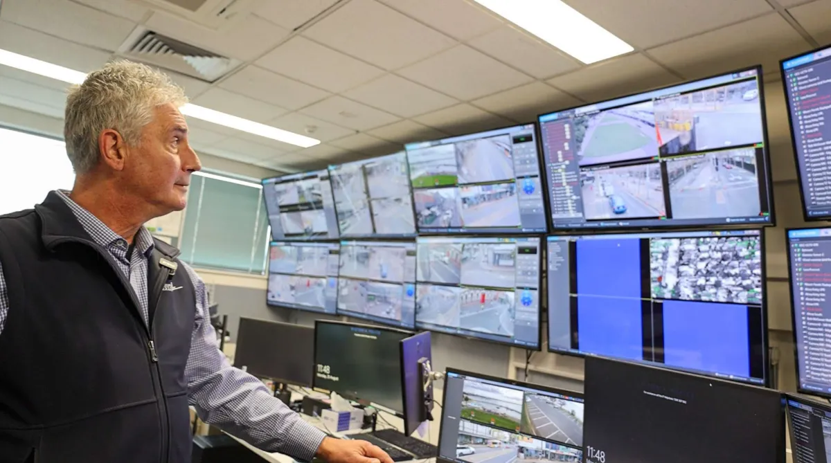 Man watching city safe cameras